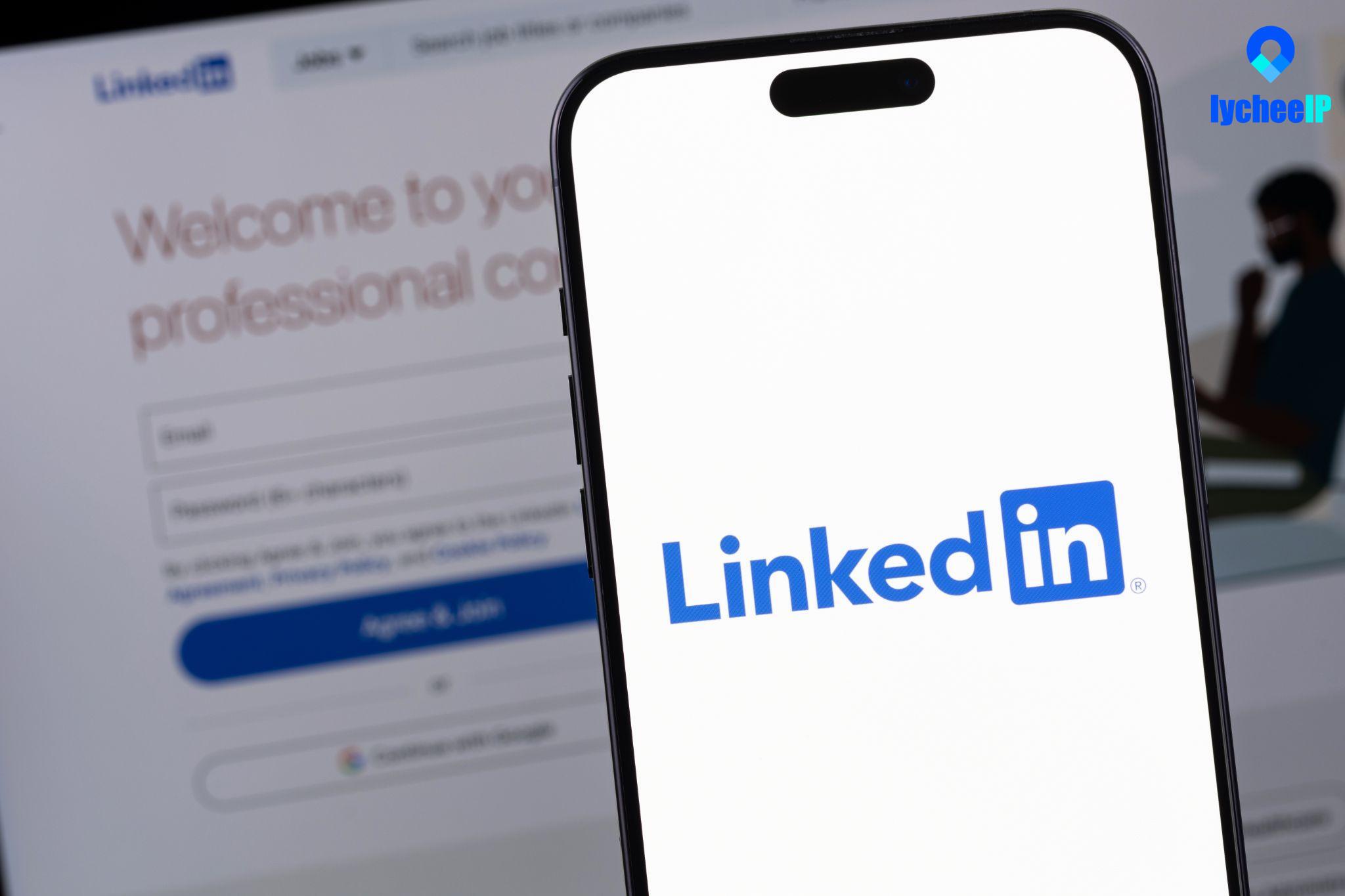 linkedin-app-open-on-iphone-and-laptop (1).jpg